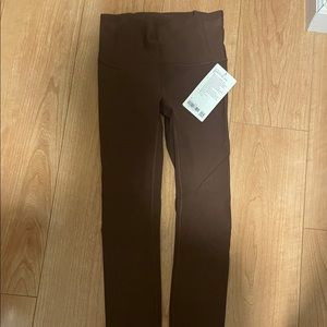 Brand new. Lululemon. Size 4. Zoned in Tights.